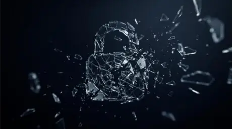 Editorial illustration of a shattered digital padlock representing the Aura data breach
