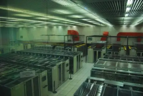 Rows of computing equipment inside the Worldwide LHC Computing Grid data centre