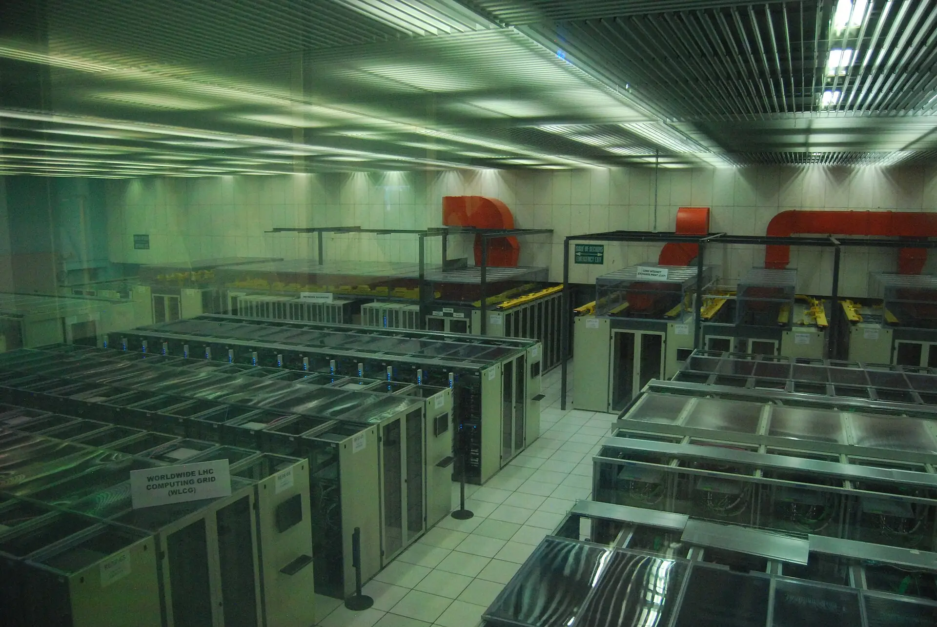 Rows of computing equipment inside the Worldwide LHC Computing Grid data centre