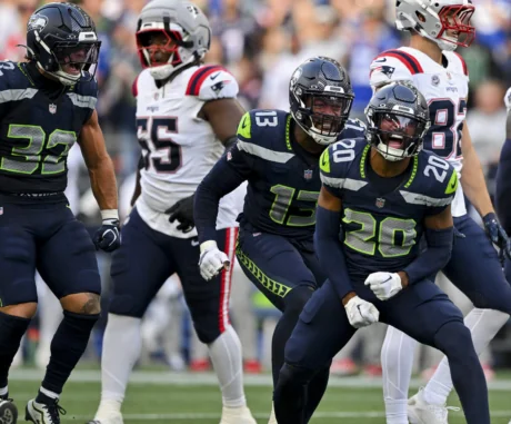 Seattle Seahawks defenders celebrate against the New England Patriots