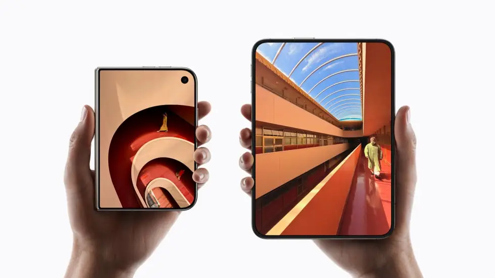 Hands holding the folded and unfolded iPhone Duo