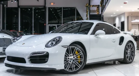 White Porsche 911 shown in the Justice Department’s Britton-Harr case release