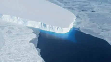 Aerial view of Thwaites Glacier’s ice edge and dark seawater in Antarctica, photographed in 2014