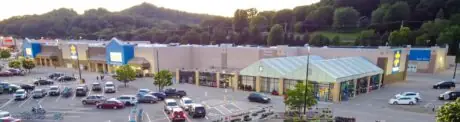Walmart store exterior and parking area in Onalaska, Wisconsin, photographed in June 2024