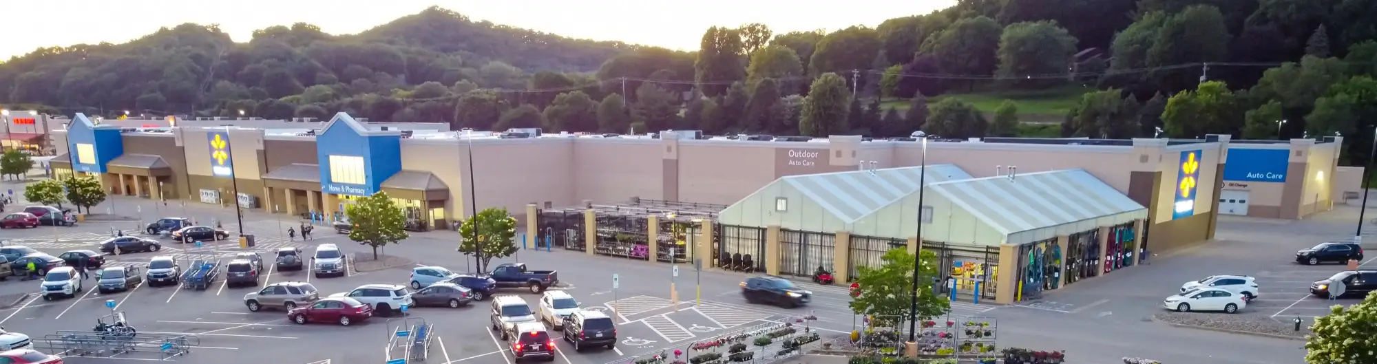Walmart store exterior and parking area in Onalaska, Wisconsin, photographed in June 2024